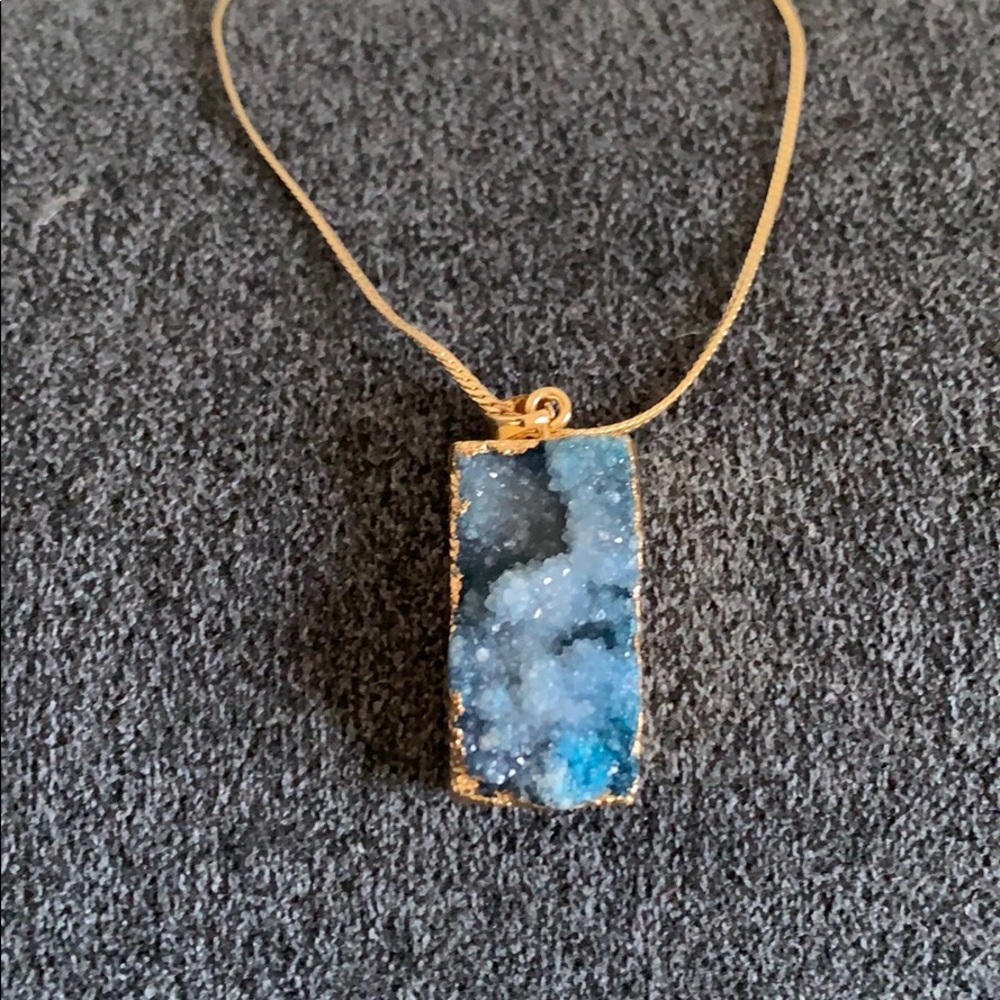 Brand new necklace with blue crystal
